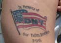 Thumbnail of tattoo on arm of Bill Haigler paying tribute to the fallen heroes of 9-11