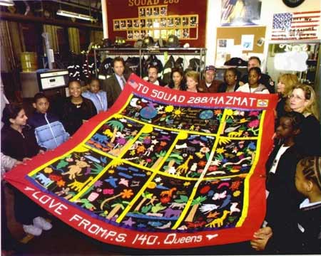 Deborah Davis is a teacher in South Jamaica, Queens. Every year she has a Native American Art Club and after the horrific tragedy  of September 11th , she decided that the 9 children in her class would make a quilt to honor the lost firefighters and police officers.