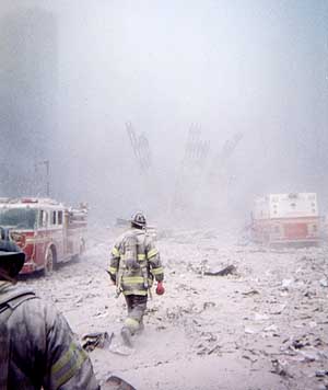 Two Firefighters who are victims of the World Trade Center attack, (left and in forground and only partially visible) is Robert Curatolo who is confirmed dead, and in the middle is Ray Murphy who is still being listed as missing.