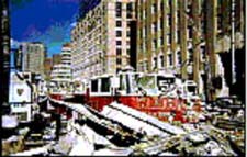 The truck of Ladder 118 lies buried in debris from the World Trade Center.