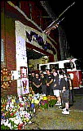 Surviving Engine 205/Ladder 118 firemen pay respects to fallen housemates.