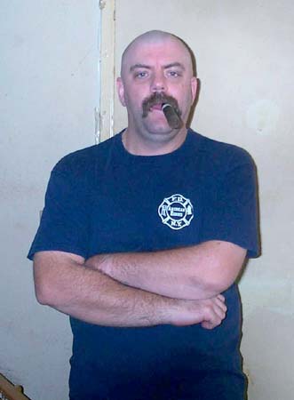 Cowboy Jack, a friend of mine from the left coast, Torrance, California - Showing his love of the FDNY - He went Bald for the Brothers