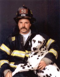 Firefighter Gregory Sikorsky  and dalmation